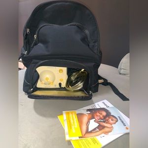 Medela Breastpump in book bag